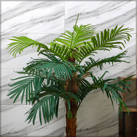 Large fake plants displayed in a corner for a fresh natural look