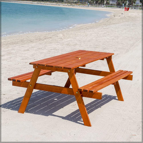 Outdoor wooden bench with built-in umbrella holder for shade