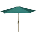 Green patio umbrella with tilted adjustment for sun protection