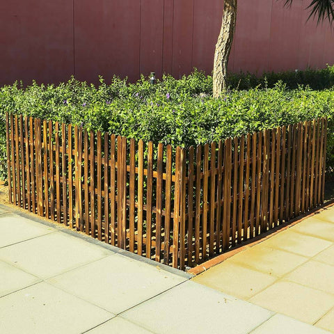 Portable wood fence for garden creating custom garden borders