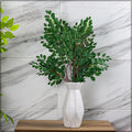 Faux tree branches with leaves