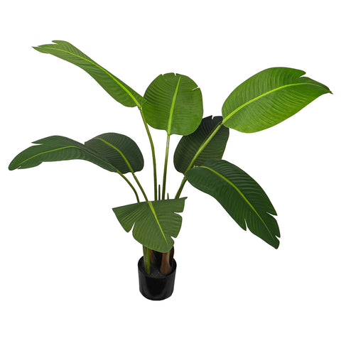 Realistic artificial banana leaf plant in a cozy office space