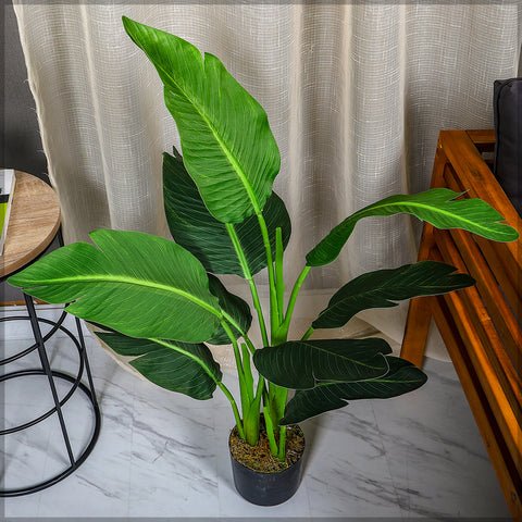 Close-up of realistic artificial banana tree for indoor spaces