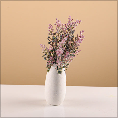 Elegant modern ceramic vase with sculptural features