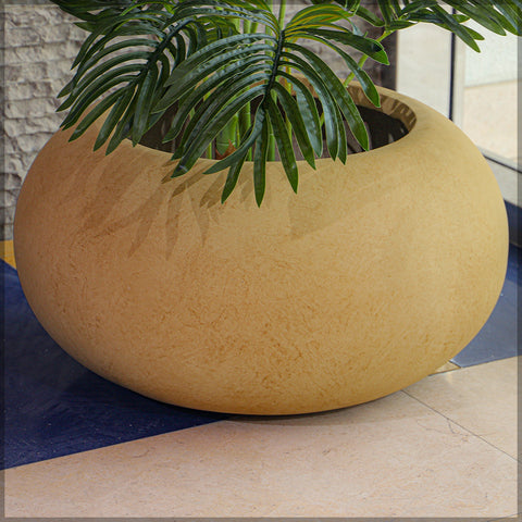 Decorative brown round concrete planter