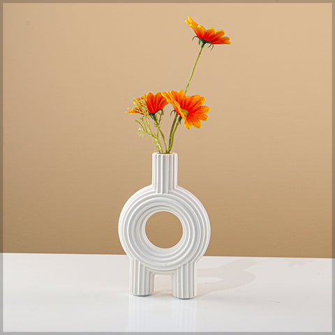 Sleek ceramic table top vase for minimalist decor