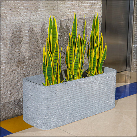 gray rectangular planter box with drainage hole