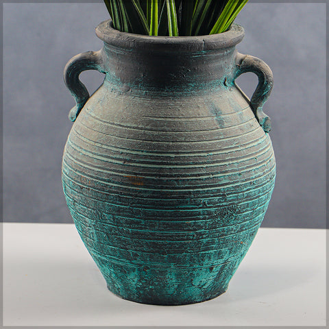 Elegant small clay jar with handle