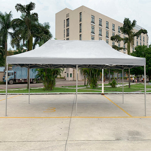 Waterproof event canopy tent offering protection from rain