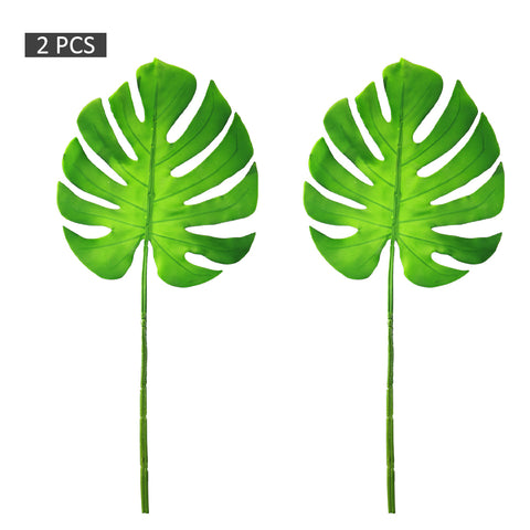 Lifelike faux monstera leaves for wall art