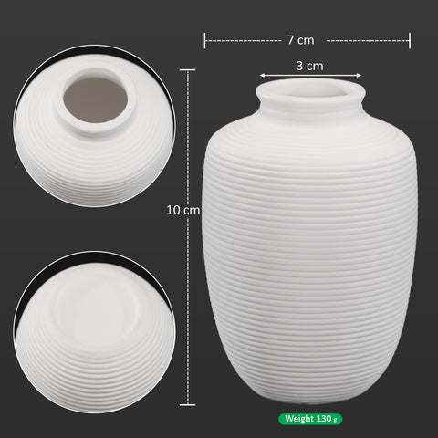 Small white ceramic vase with sleek design